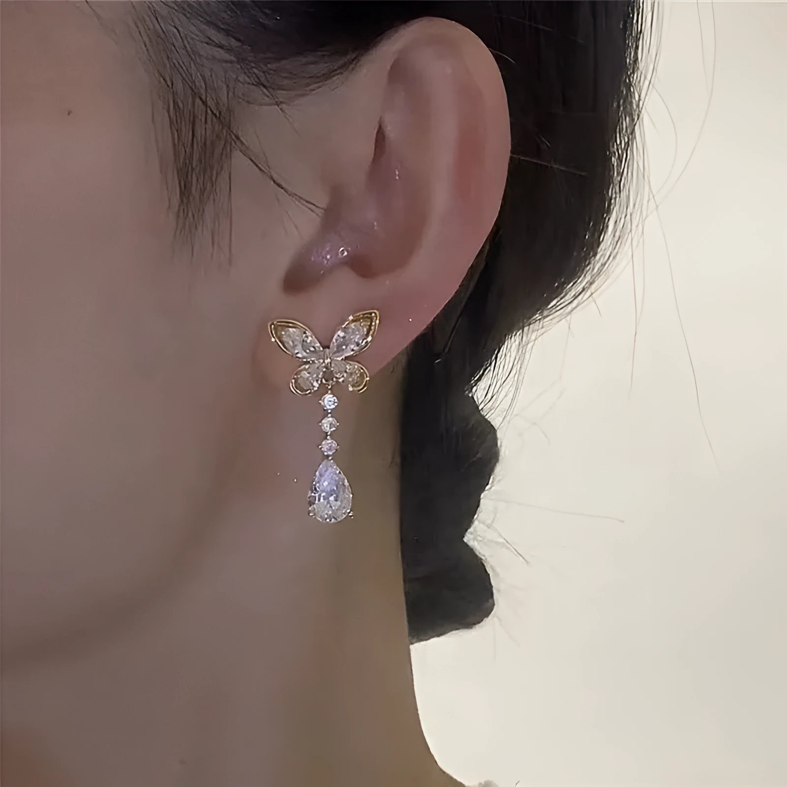 Platinum colour bow-shaped stud earrings with zinc alloy electroplated construction