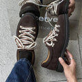 Men's outdoor casual shoes with rubber sole, striped pattern, and round toe in black colour