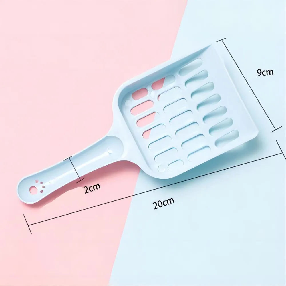 Plastic cat litter scoop in blue, green or pink measuring 20cm long by 9cm wide