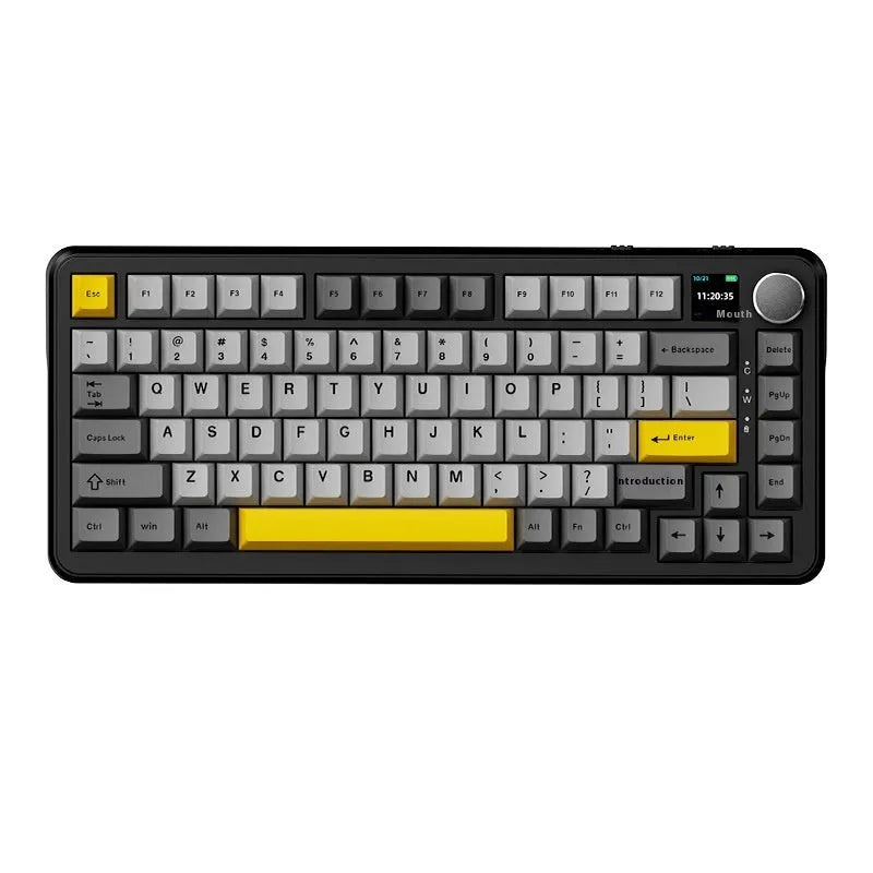 Black, grey, and yellow three-mode wireless mechanical keyboard with UK layout on a desk.