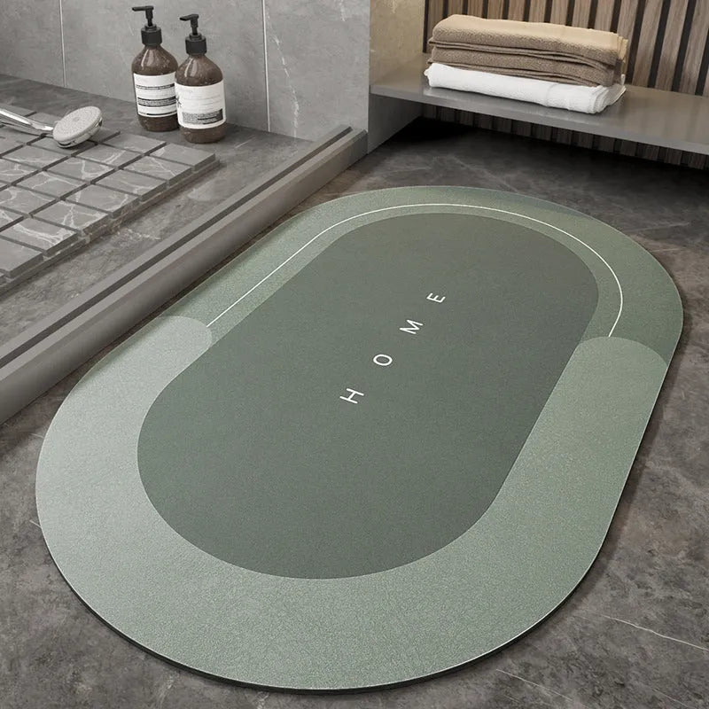 Bathroom floor mat in blue colour, oval shape, showing machine-woven blended texture