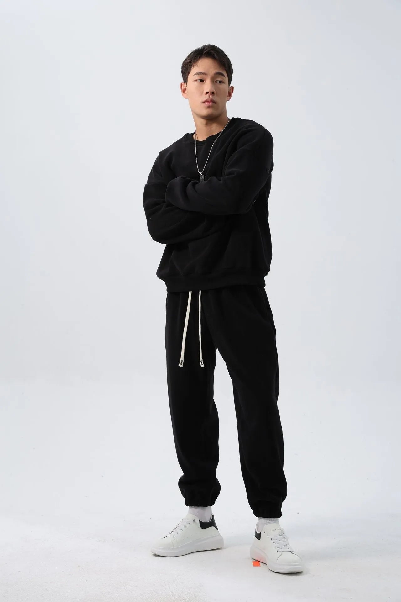 Men's polar fleece sports suit set showing jacket and trousers in winter colours
