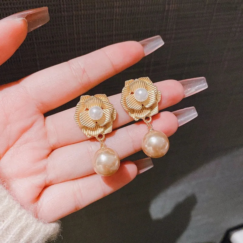 Gold Hong Kong style floral stud earrings with pearl and opal decoration