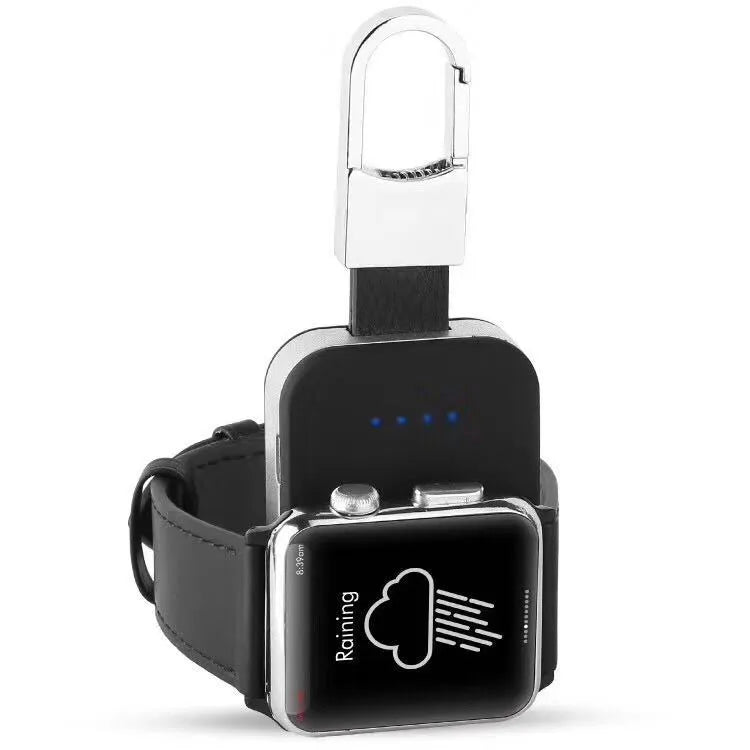 Black Apple Watch wireless charging power bank on a keyring, showing compact size.