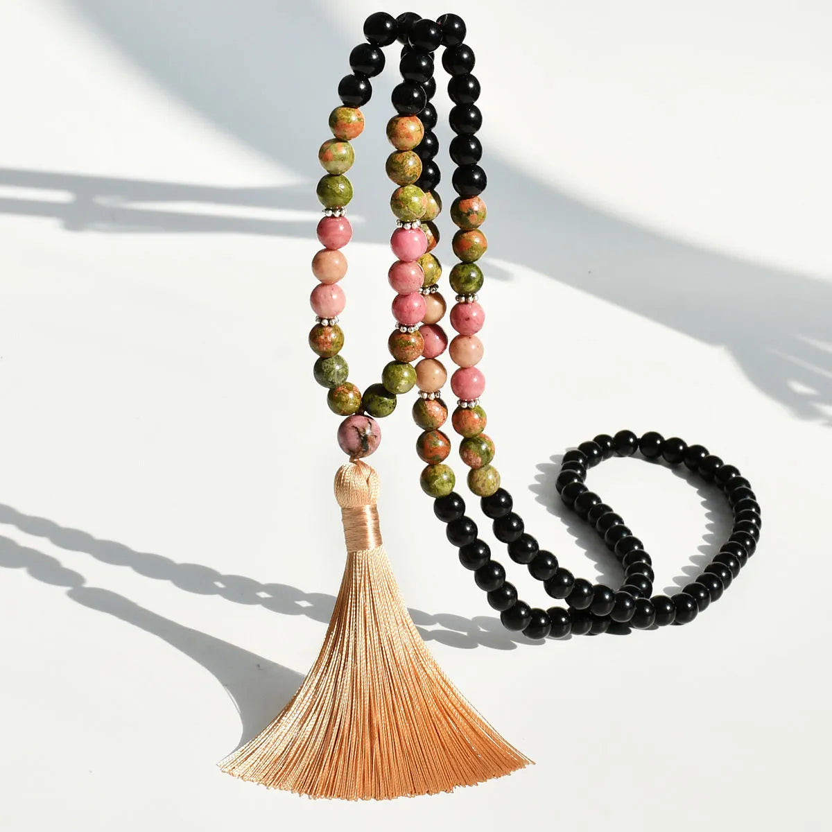 Long 108 natural stone bead necklace with mixed gemstone tassel pendant in bohemian style.