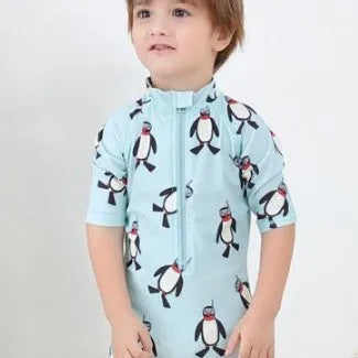 Boys' penguin print long sleeve swimming costume set with matching swim cap for sun protection