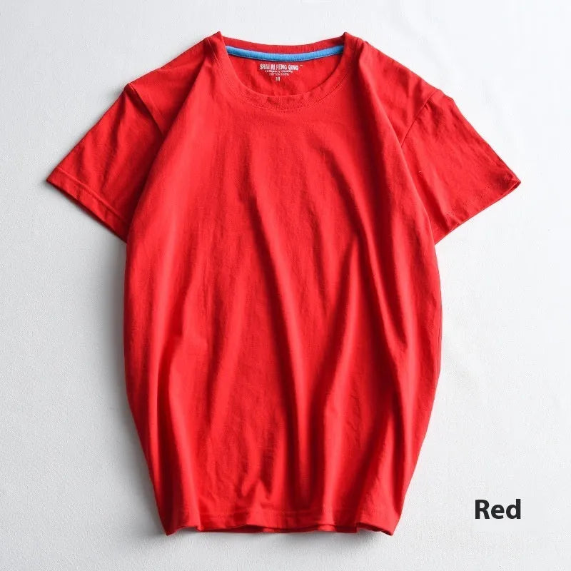 Men's solid colour cotton t-shirt on a hanger, showing round neck and short sleeve design.