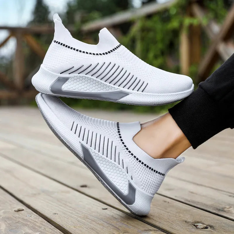 Men's striped mesh slip-on sneakers with flyknit upper and lace front in black colour variant