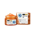 A 50g tube of turmeric and emu oil joint pain relief gel with mint leaves.