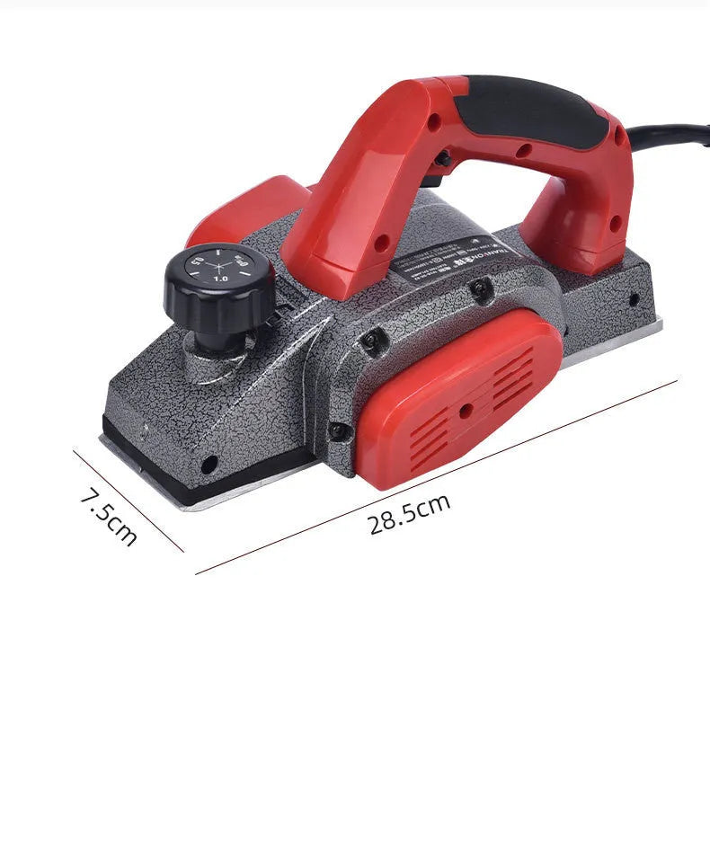 Red electric wood planer with 82mm cutting width and aluminium shell construction