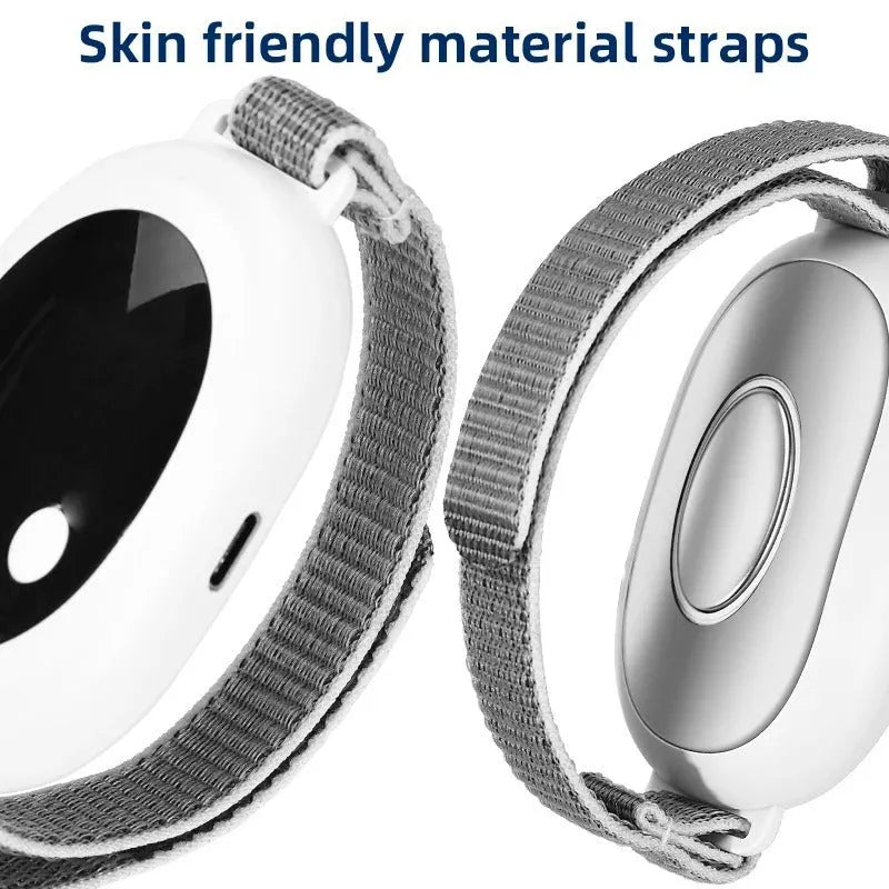 White insomnia help device with handheld remote control, sleep bracelet attachment, and USB charging cable