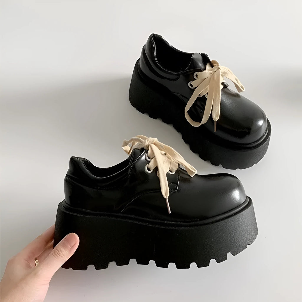 Matte black women's lace-up shoes with a chunky 6-8cm platform heel and round toe.