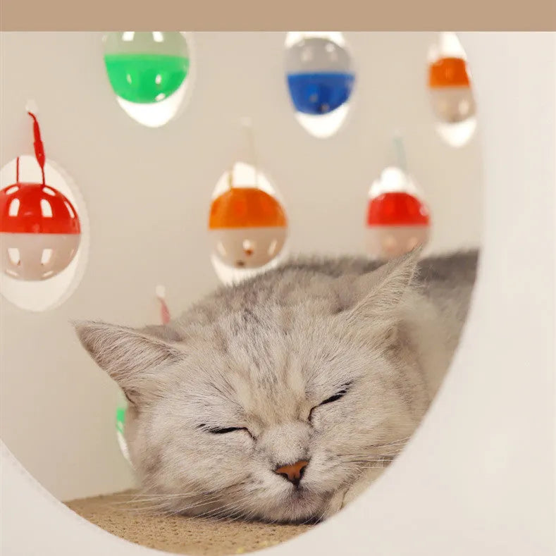 Integrated cat scratch board and nest toy with tunnel design and bell ball