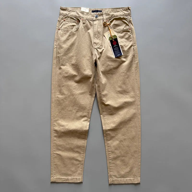 Men's grey cotton straight leg casual trousers laid flat showing mid waist and straight cut.