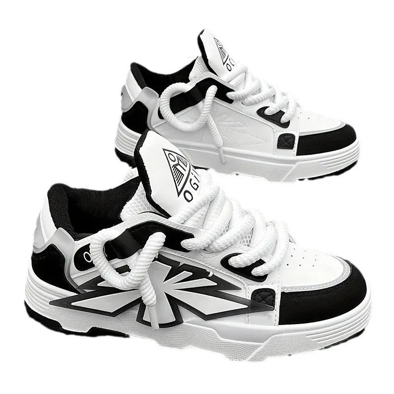 Men's white chunky sneakers with thick rubber sole, cartoon totem patterns, and lace-up front.