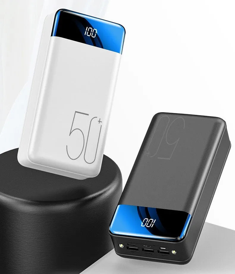 Large 50000mAh capacity power bank with three USB charging ports in black plastic case