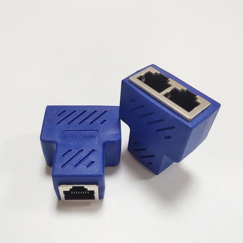 Two white RJ45 network cable splitter adapters showing three ports each.