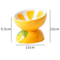 Ceramic raised cat food bowl with tilted design in a colourful pattern, showing slip-resistant base.