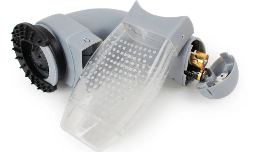 Gray handheld electric pet hair vacuum cleaner with rubber grooming head.