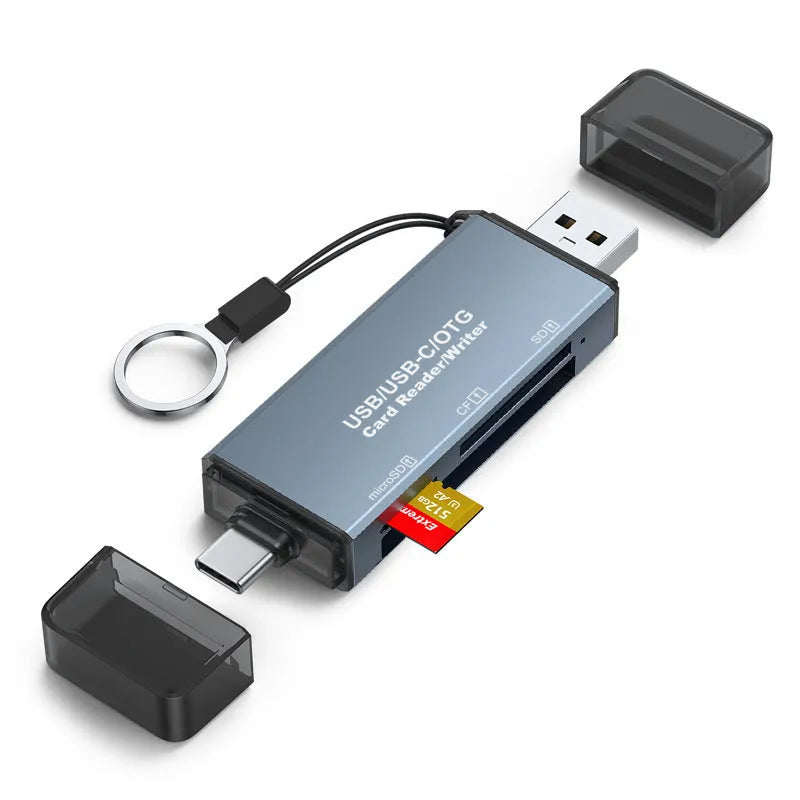 Silver aluminium CF, SD and TF three-in-one USB memory card reader on a white background.