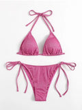 Women's split bandage style bikini swimsuit in polyester, shown in one of six available colours.