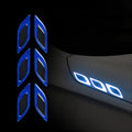 Blue and yellow reflective resin strips for car bumper and wheel arch protection.