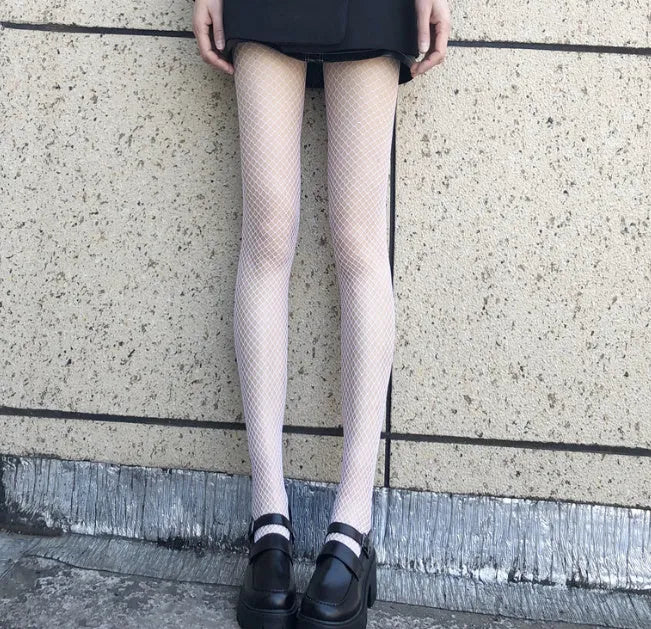Women's solid color mesh stockings in black and white with anti-hook thin polyester fabric in large medium and small net sizes.