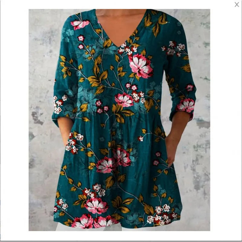 Women's loose fitted printed wave dress with 3/4 sleeves and wide waistband on hanger