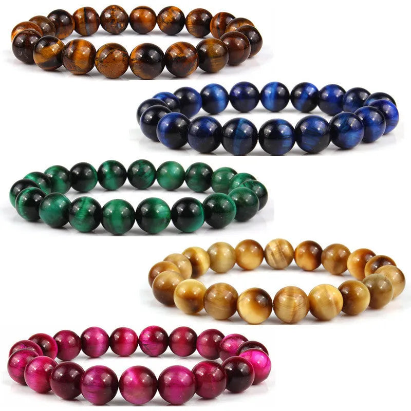 Natural tiger eye crystal bracelet with round beads in multiple colour options on a wrist.