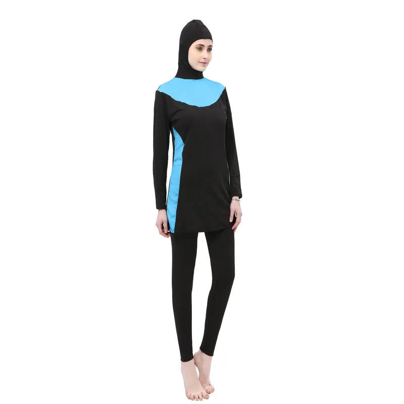 Conservative black women's swimsuit with long sleeves, a hood, and matching pants.