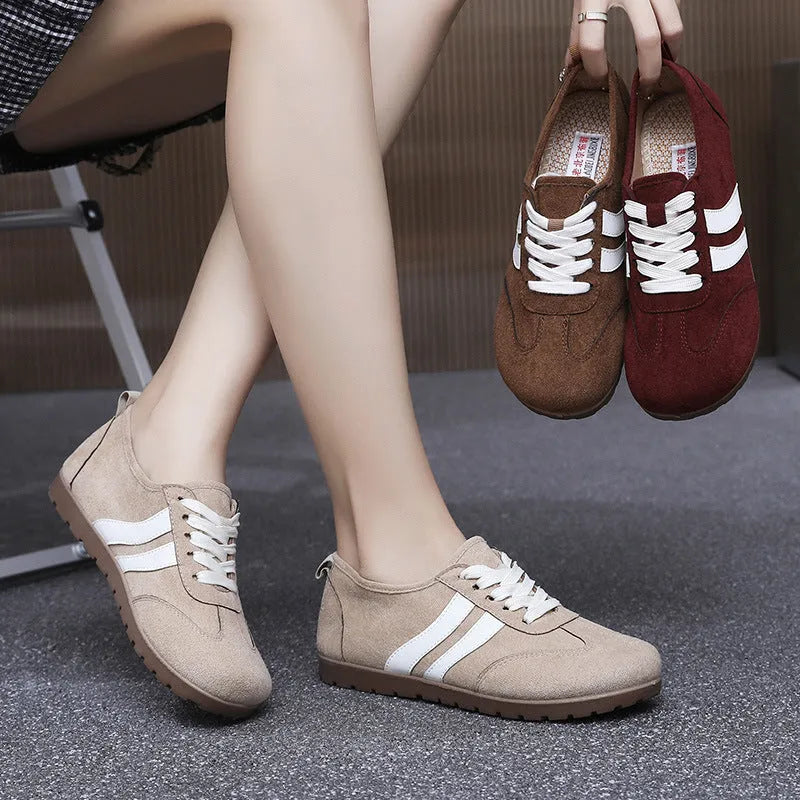 Women's canvas sneakers with round toe and flat rubber sole in dark red colour