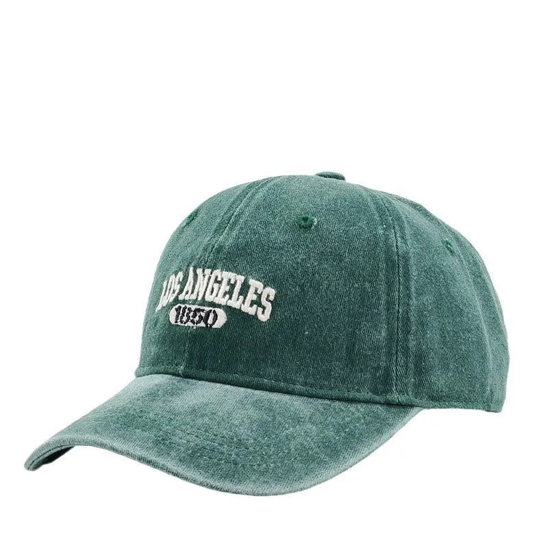 Retro peaked cap with distressed letter embroidery in conical crown style, adjustable 54-59cm fit