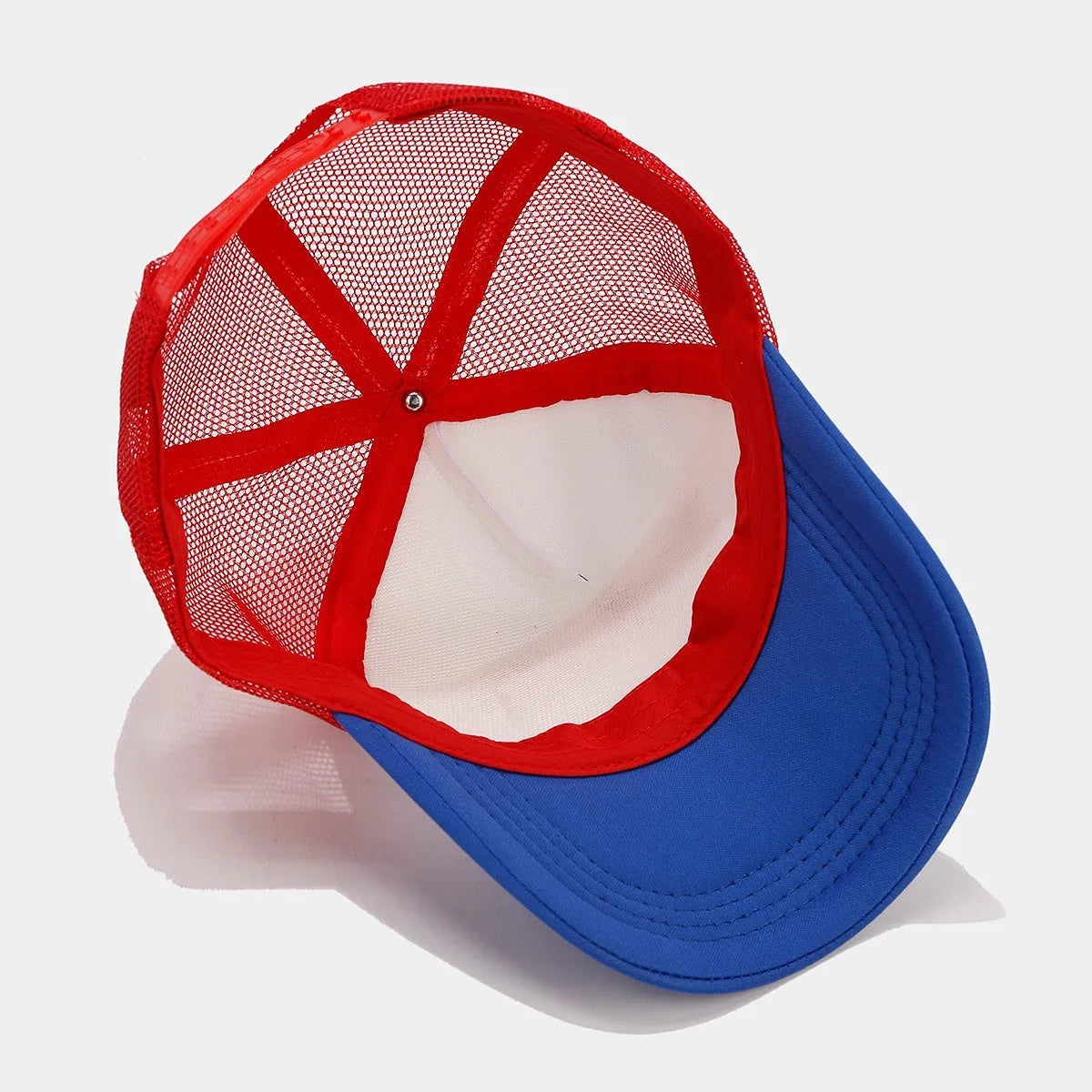 Red and blue contrast mesh breathable baseball cap with adjustable strap and dome crown.