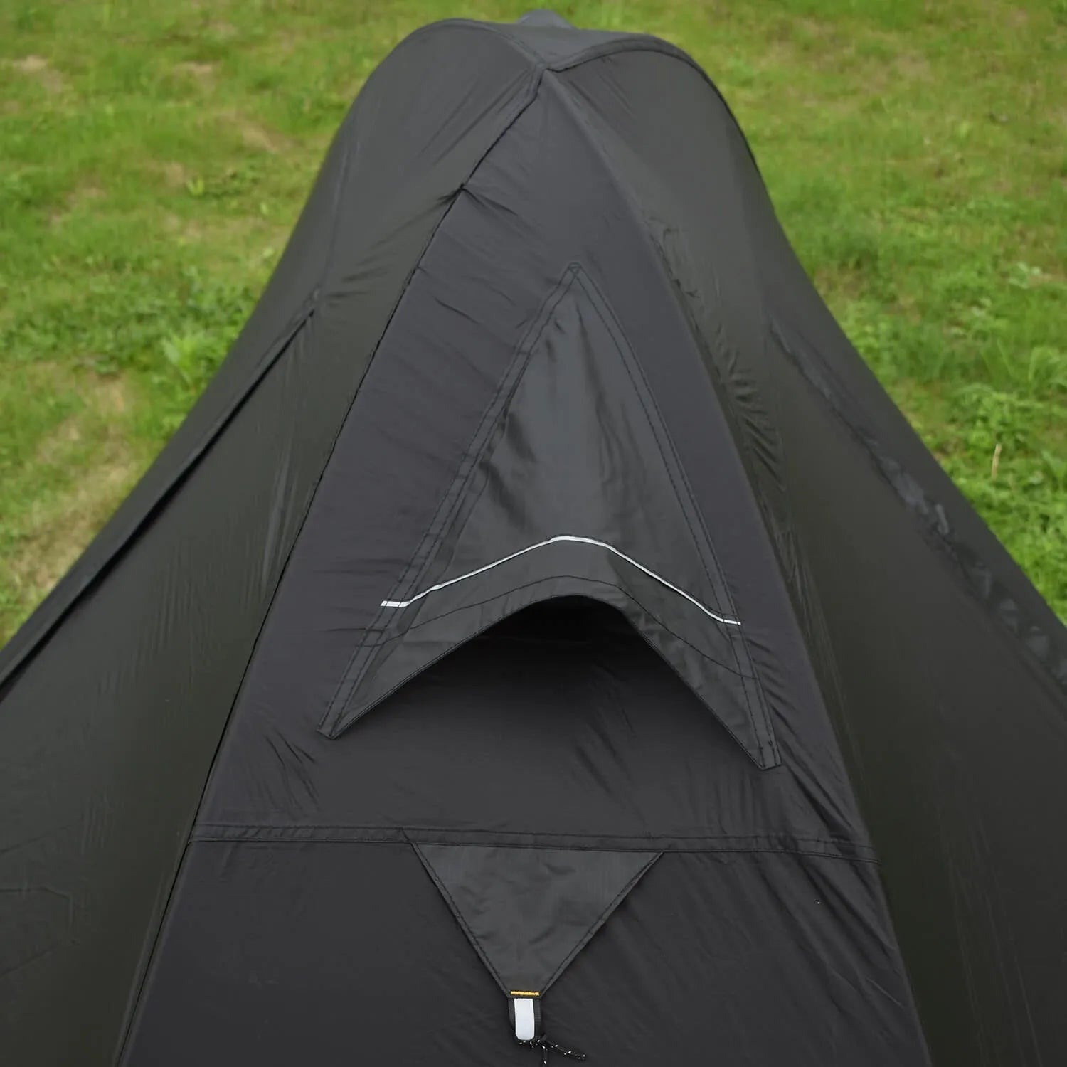 Single person dome tent with aluminum poles in a choice of red, black, or orange colours, shown pitched.