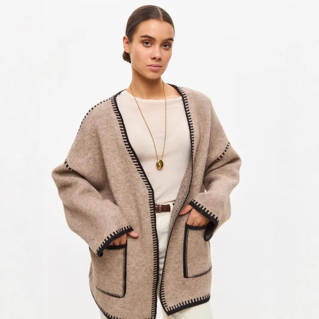 Loose fit knitted cardigan with lace-up sleeves in camel colour showing mid-length design