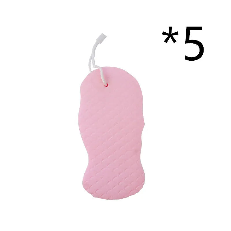 3D fish scale pattern bath sponge ball in assorted colours on a bathroom background.