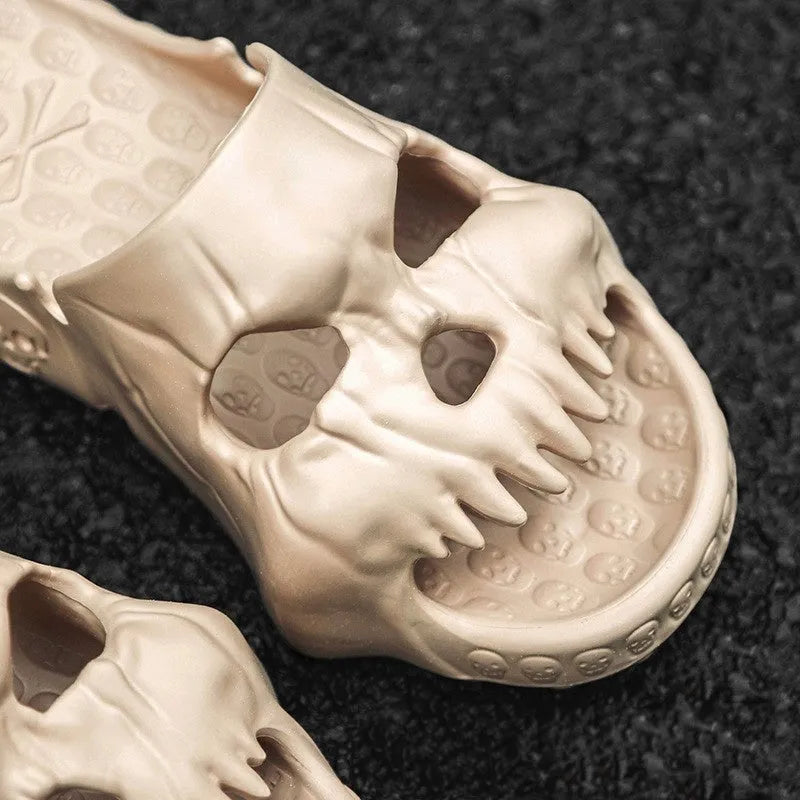 Khaki personalised skull design EVA slippers on a tiled floor, unisex Halloween flip-flops for indoor outdoor use