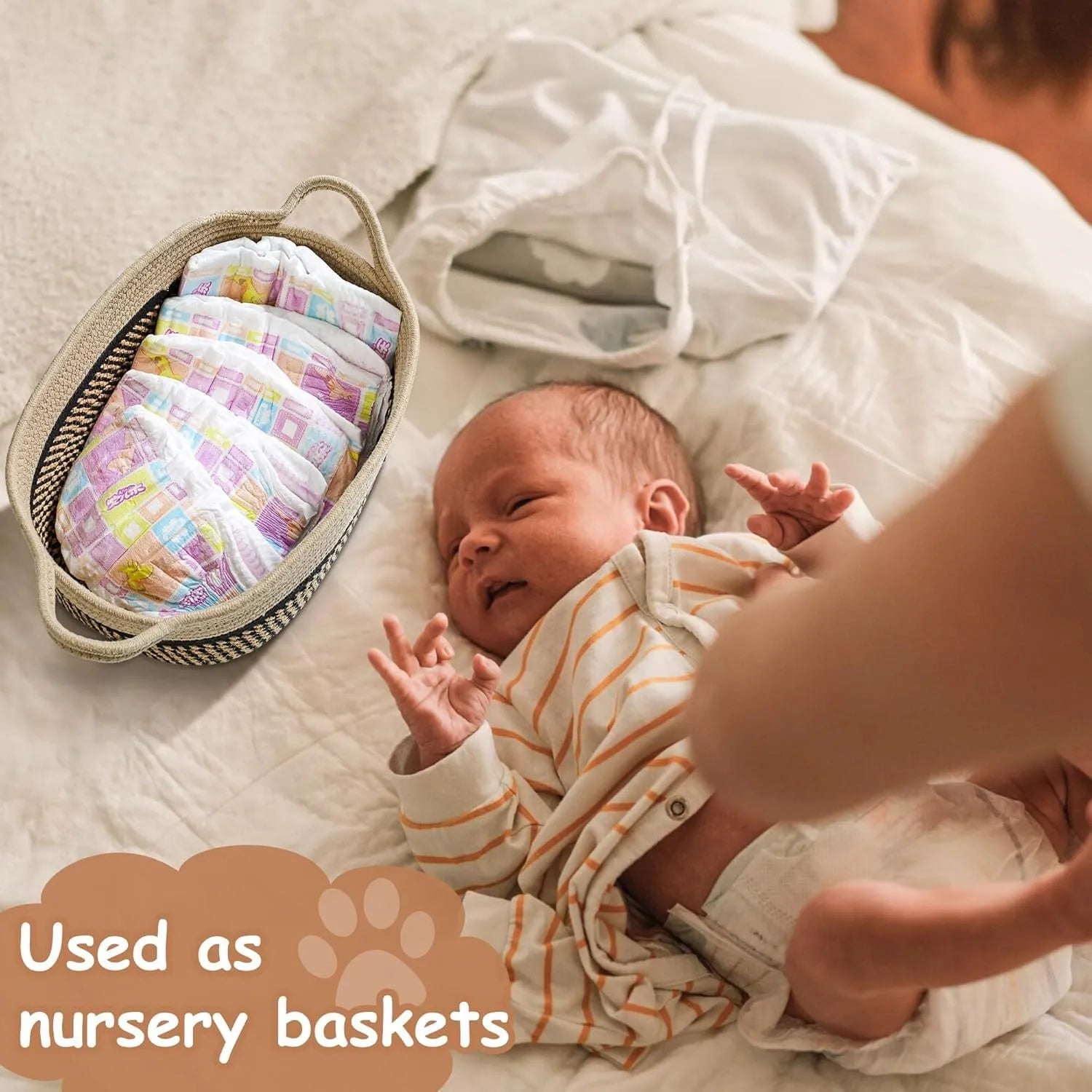 Small light beige hand-woven cotton rope storage basket with a wooden base and a handle.