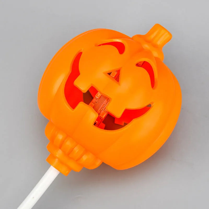 USB-powered plastic pumpkin decorative lamp showing yellow or purple light option