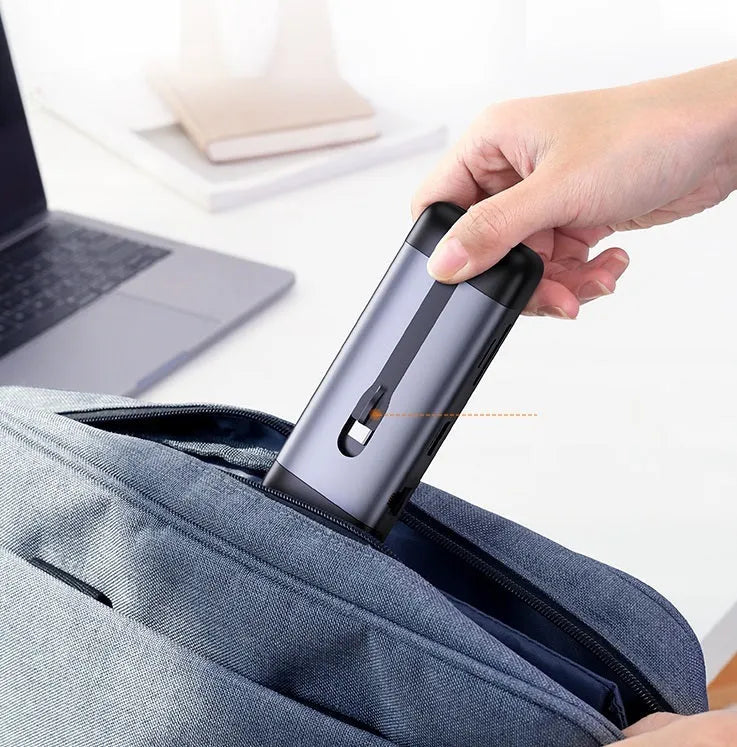 USB-C dock expansion adapter showing HDMI, USB 3.0, and Power Delivery ports with included cables