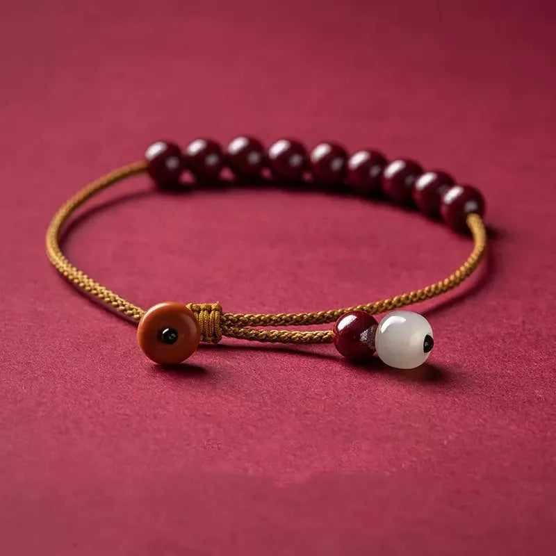 Hand-woven cinnabar bracelet with geometric beads in traditional Hetian jade style