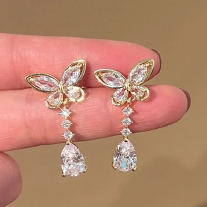 Platinum colour bow-shaped stud earrings with zinc alloy electroplated construction