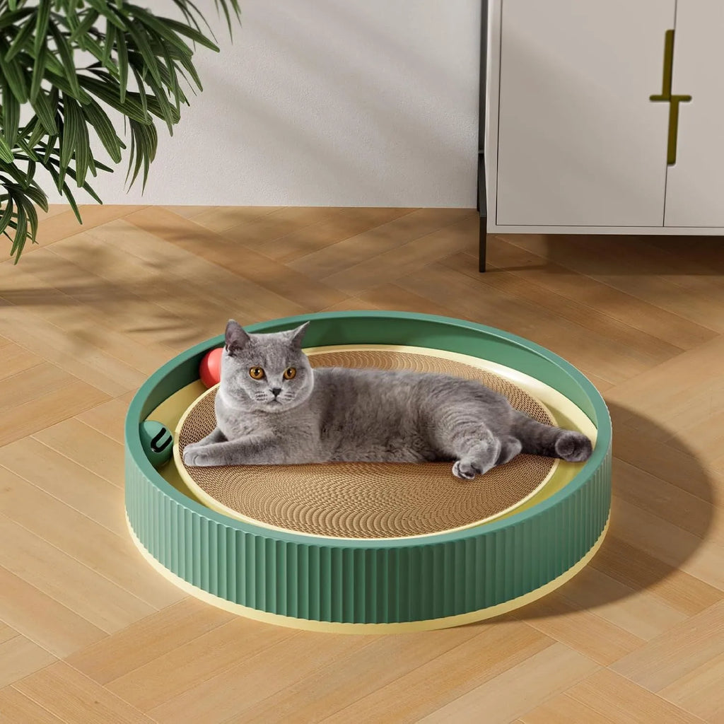 Large circular cat scratching board with replaceable cardboard centre and integrated ball toys