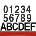 Black stainless steel sticky house number showing 7.5cm height on a door.