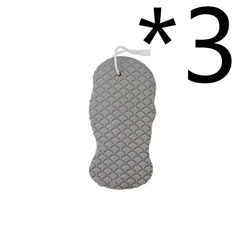 3D fish scale pattern bath sponge ball in assorted colours on a bathroom background.