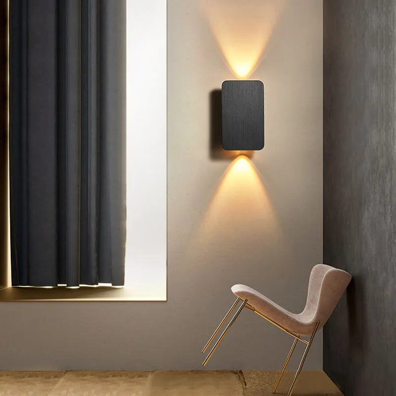 Modern Nordic minimalist LED wall lamp in black finish showing three light colour options