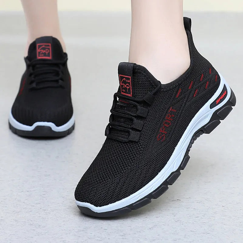 Low-top casual sneaker with a rounded toe and a lightweight PVC sole in multiple colour options.