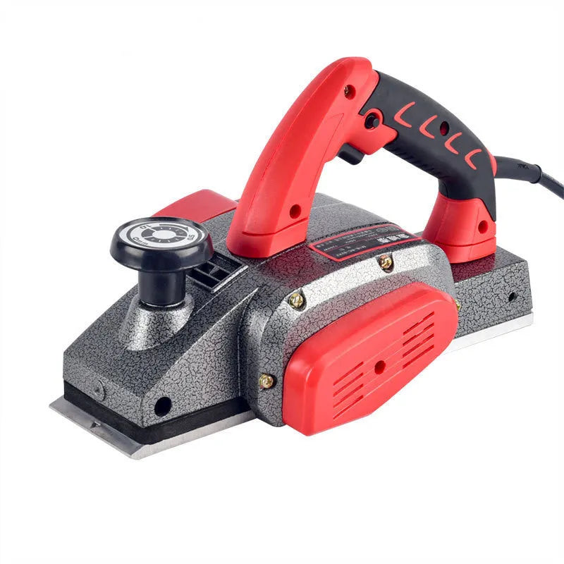 Red electric wood planer with 82mm cutting width and aluminium shell construction