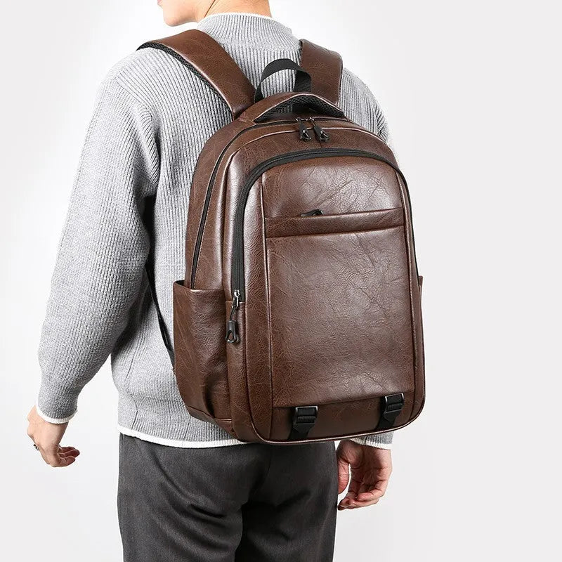 Men's large capacity leisure backpack in khaki, PU material, curved shoulder strap, 47x33x18cm