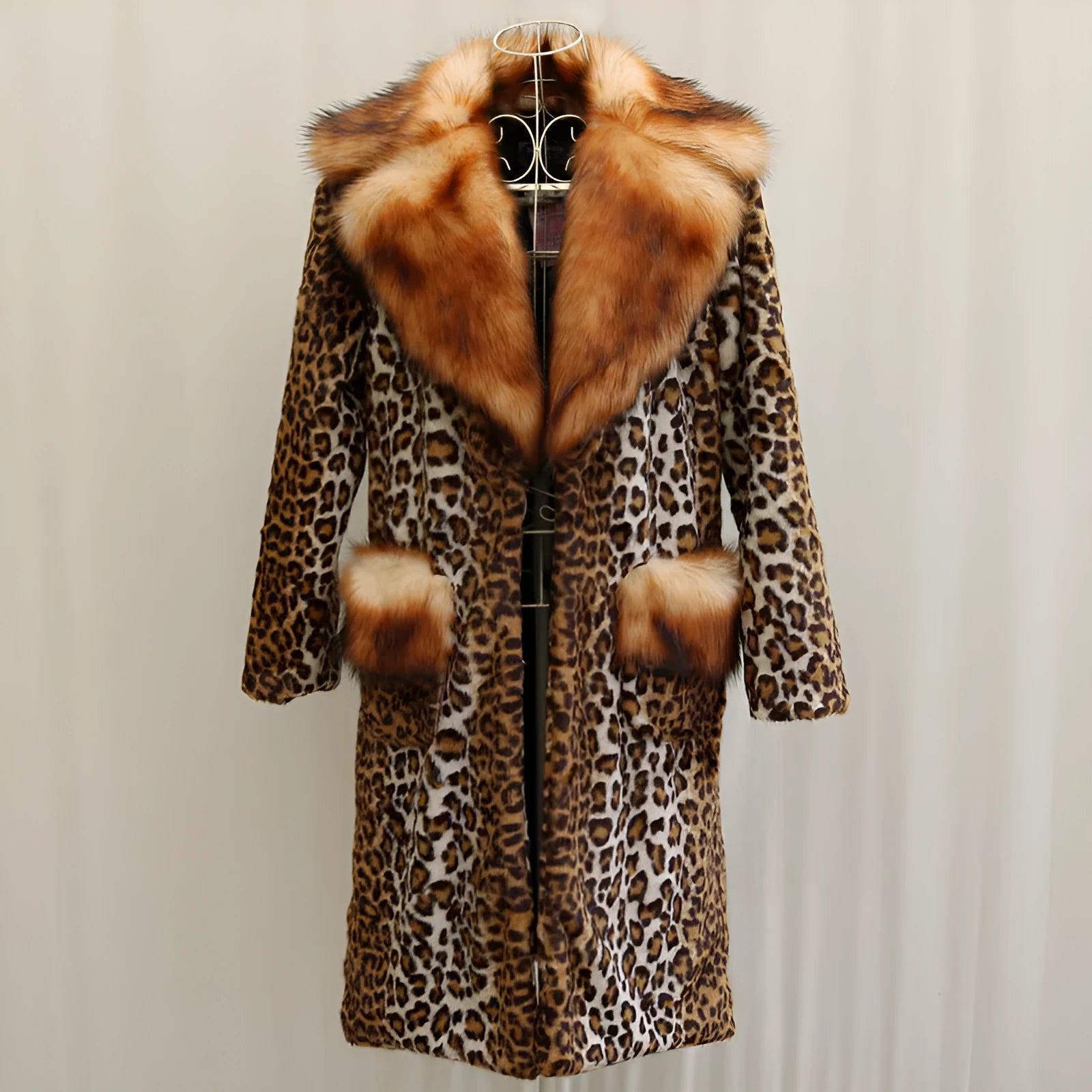 Women's long leopard print faux fur jacket with regular sleeves, shown in a casual setting.